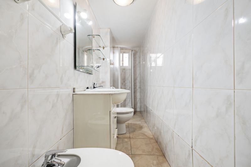 Renovated Bathroom with Tile Accents